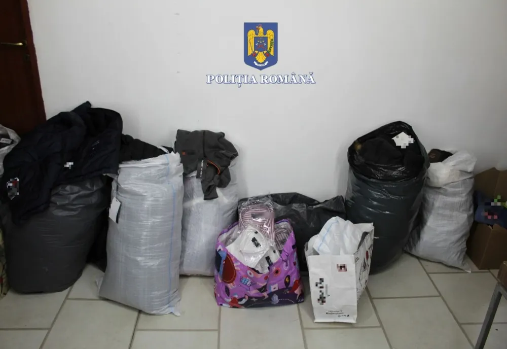 Bărbat din Zalău prins în Cluj cu haine şi parfumuri contrafăcute (FOTO)