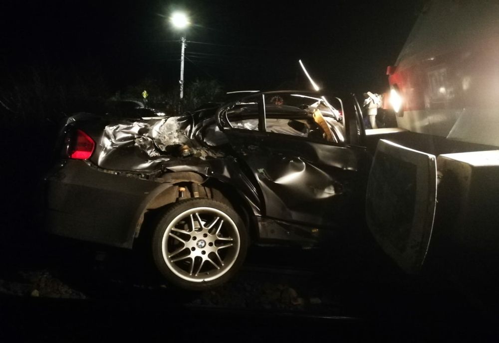 VIDEO | Mașină lovită de tren în Jucu! Momentul impactului a fost filmat