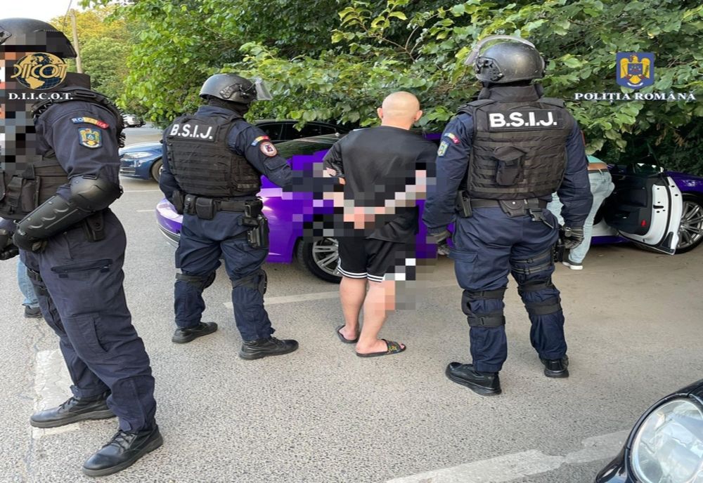 Percheziţii în Cluj şi Bucureşti într-un uriaş dosar de trafic de persoane (FOTO)