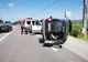 FOTO | Impact violent pe o şosea din Cluj! O persoană rănită şi o maşină răsturnată pe şosea